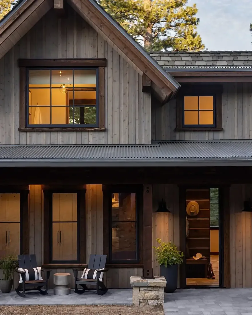 Board and batten cabin with corrugated metal porch roof