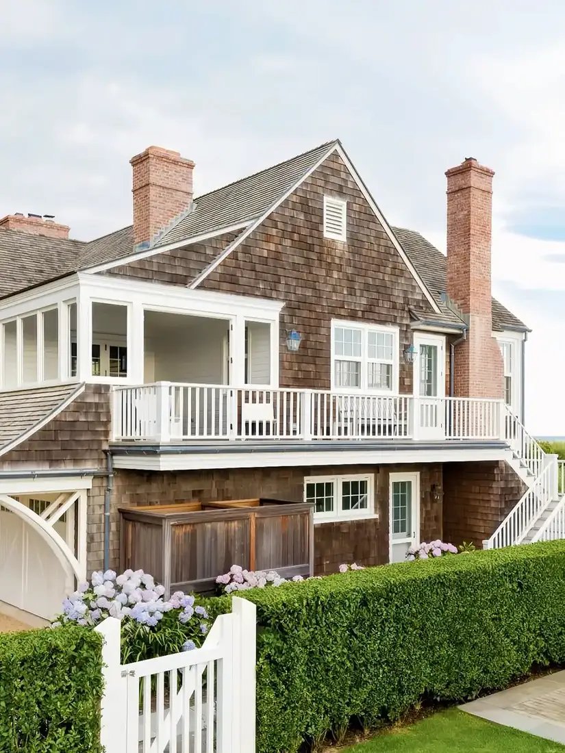 Hamptons style cedar shake home exterior with thick textured shingles