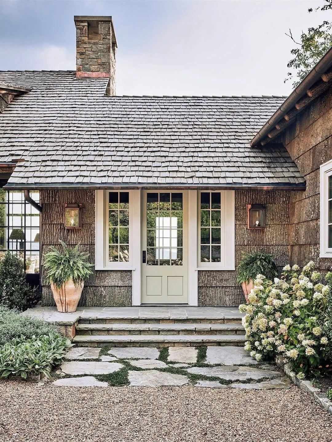 Charming cottage front door with classic trim
