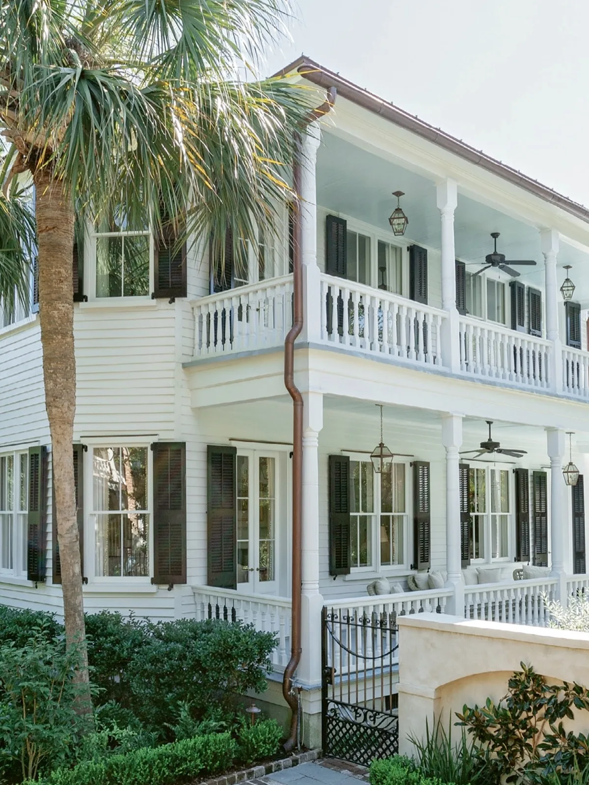 Charleston double porch house with palm trees