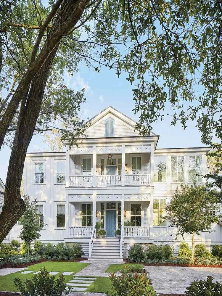 White Charleston double porch with a front walk