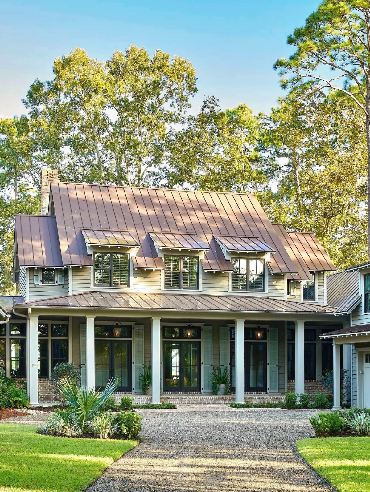 Pale green lowcountry house with a copper roof