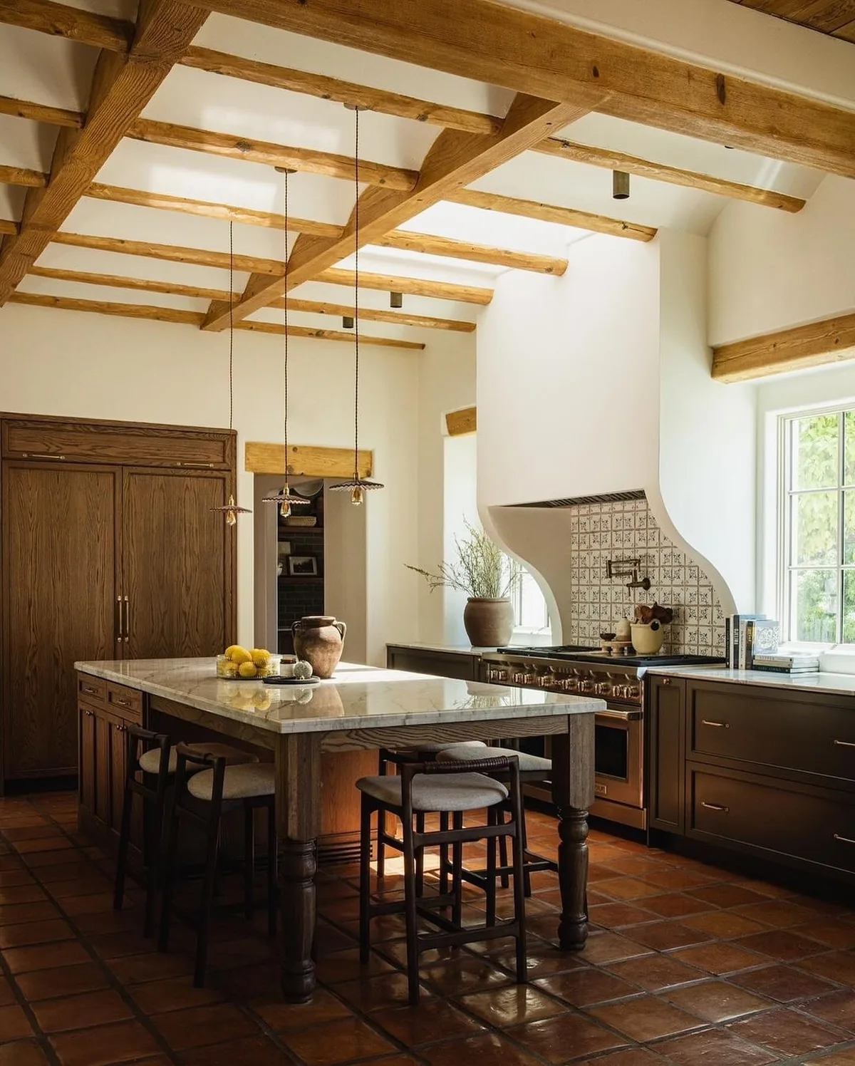 Rustic Spanish kitchen with exposed beams