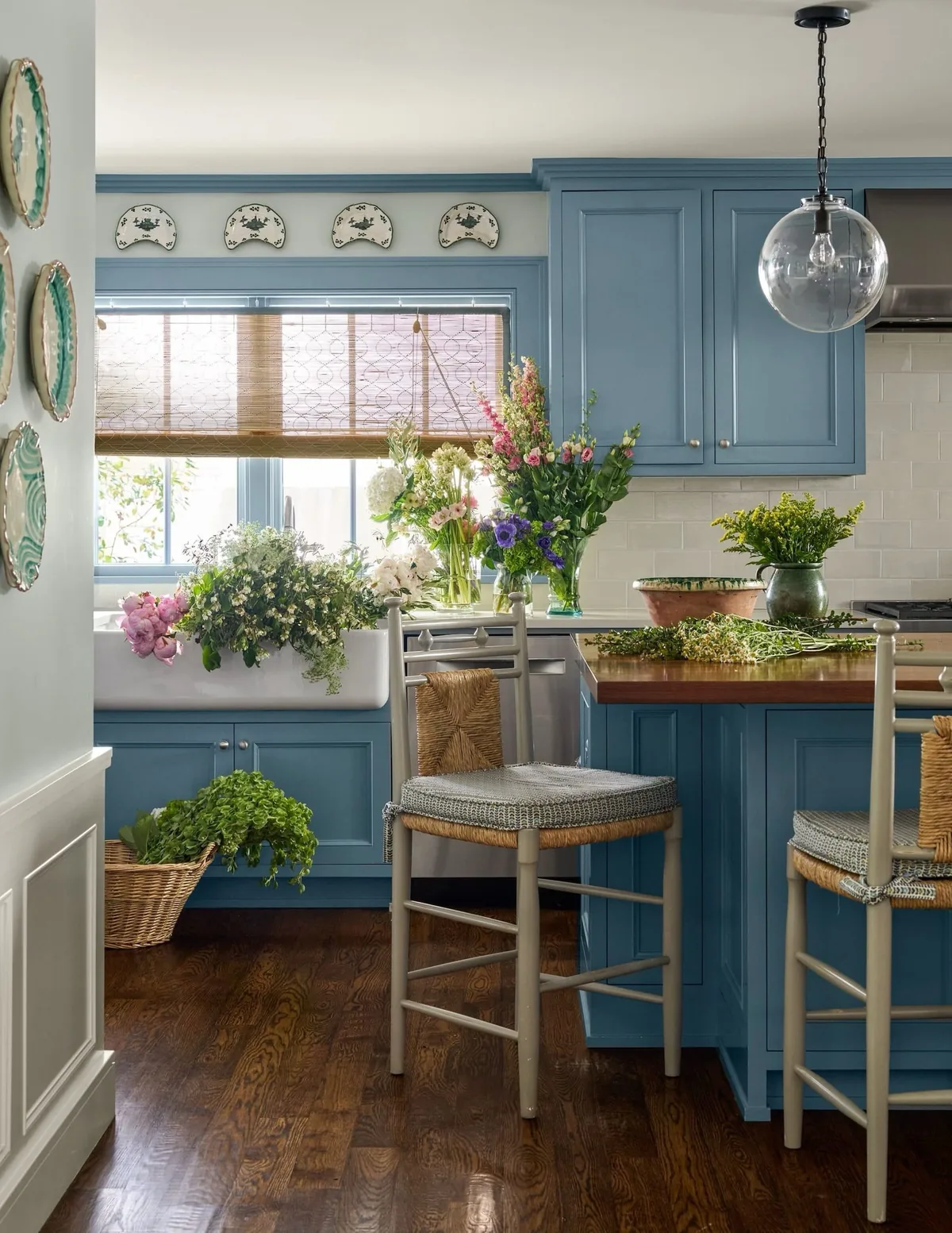 Blue cabinet cottage kitchen with a farmhouse sink