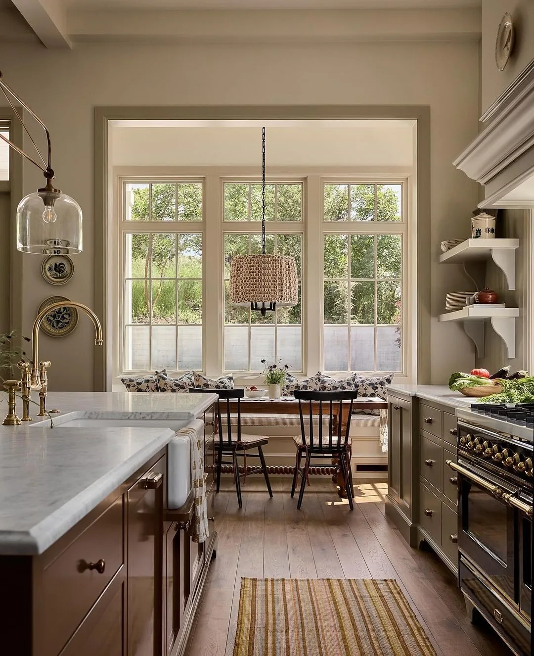 Taupe kitchen breakfast nook with windows
