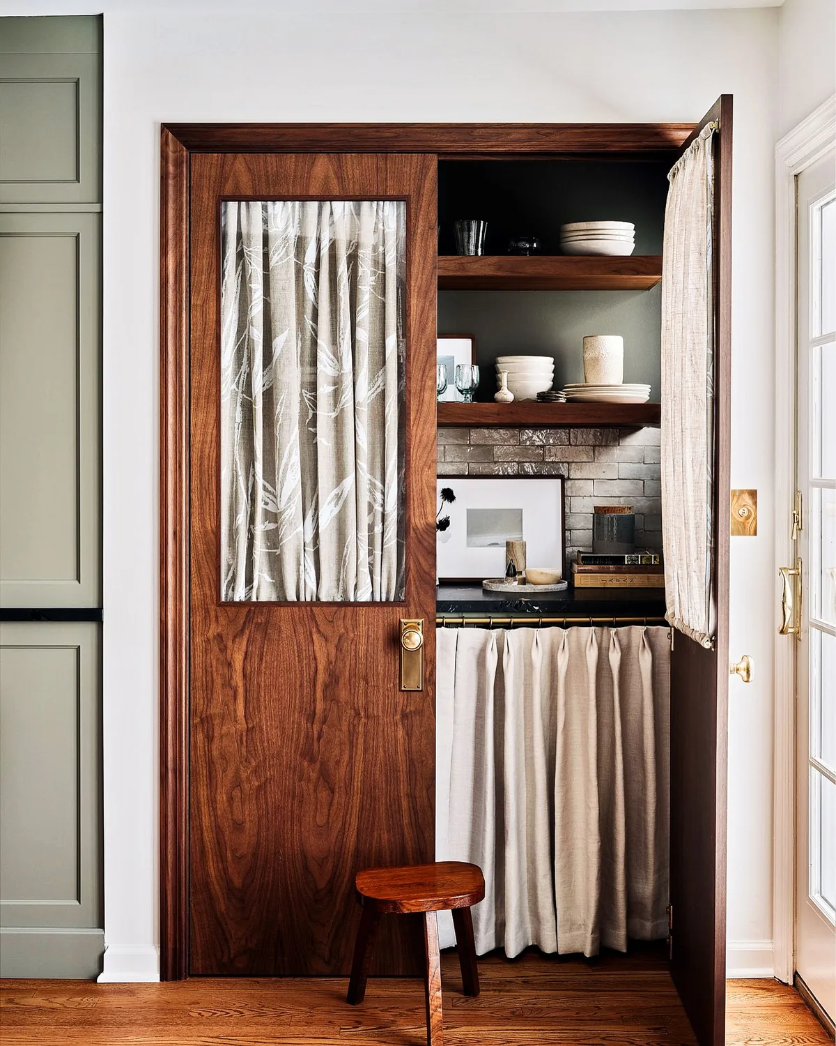Butler pantry with a curtain door