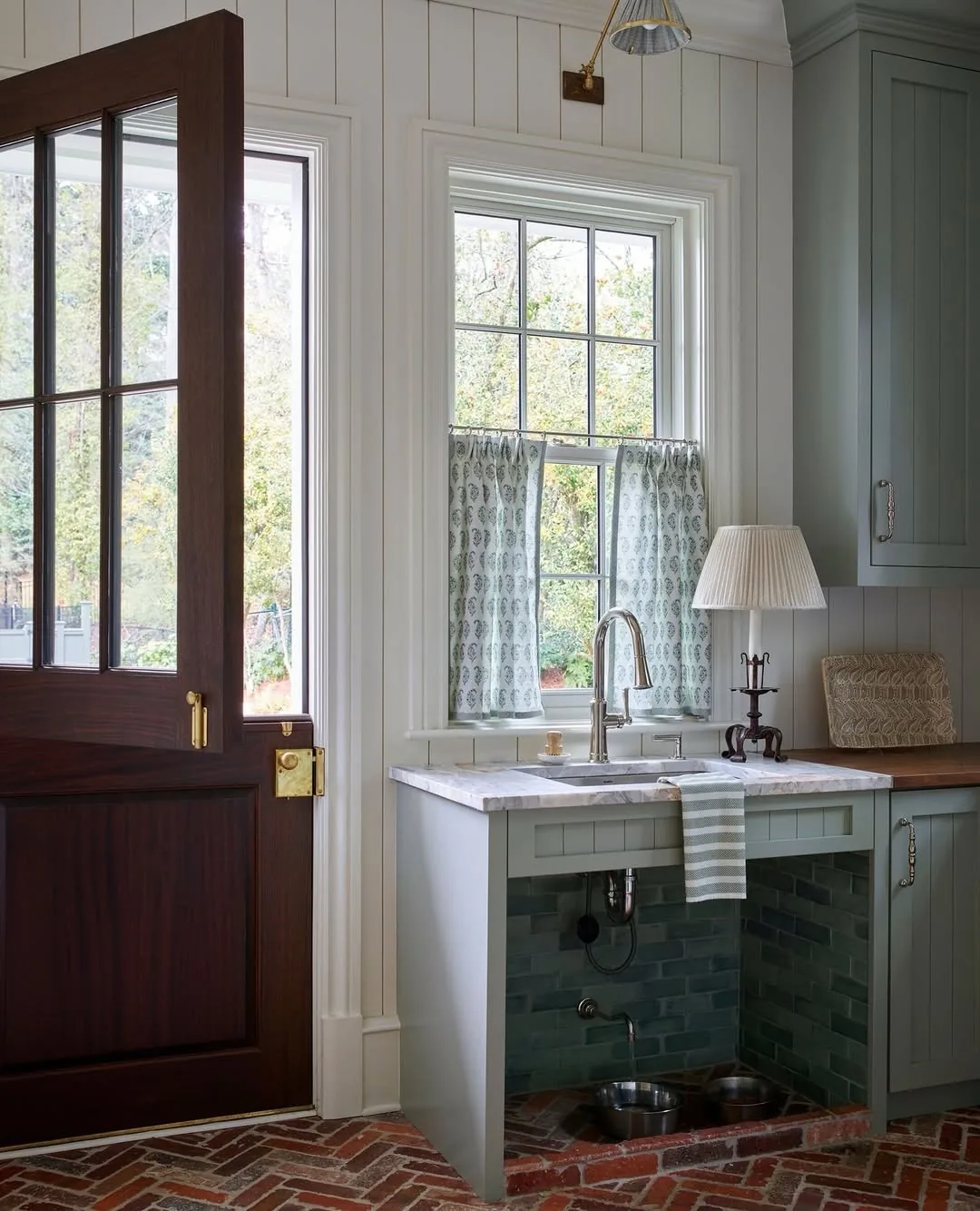 Butler pantry prep kitchen with a sink