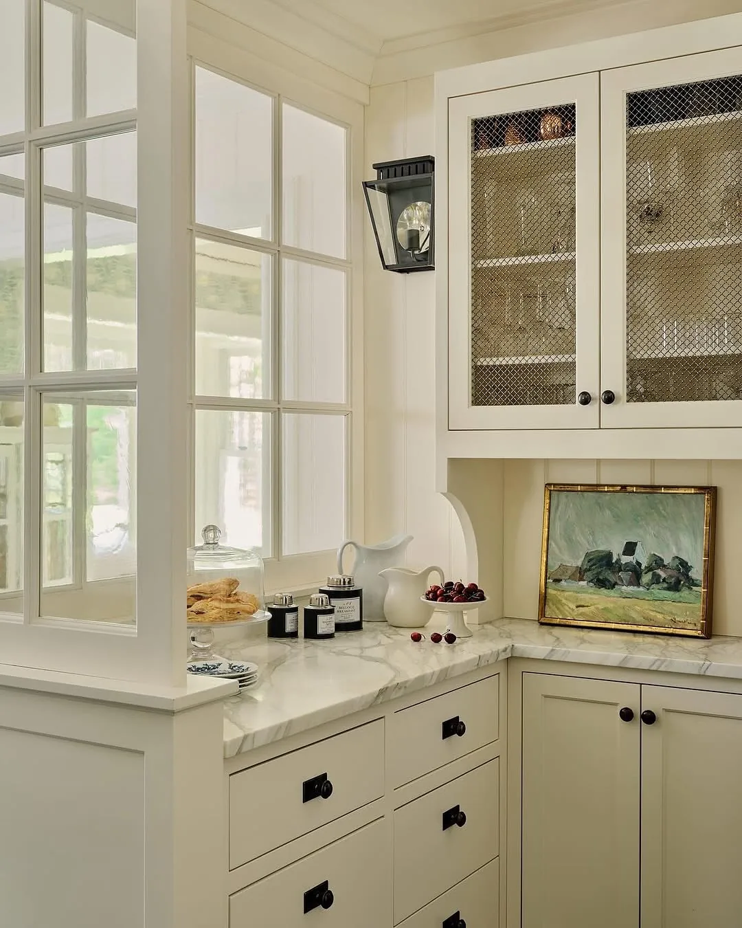 White butler pantry interior with a window