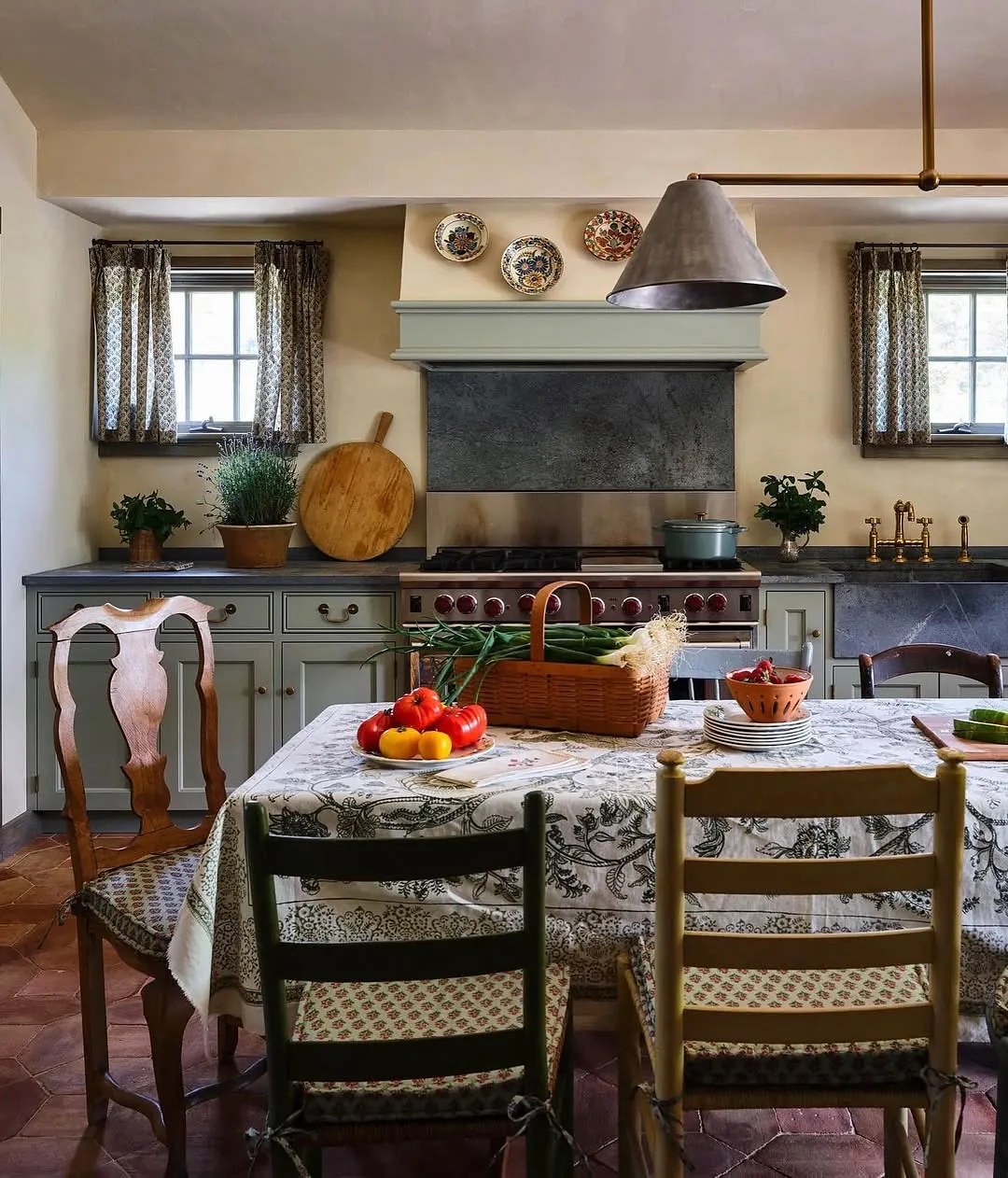 Rustic farmhouse kitchen with a dining table and chairs