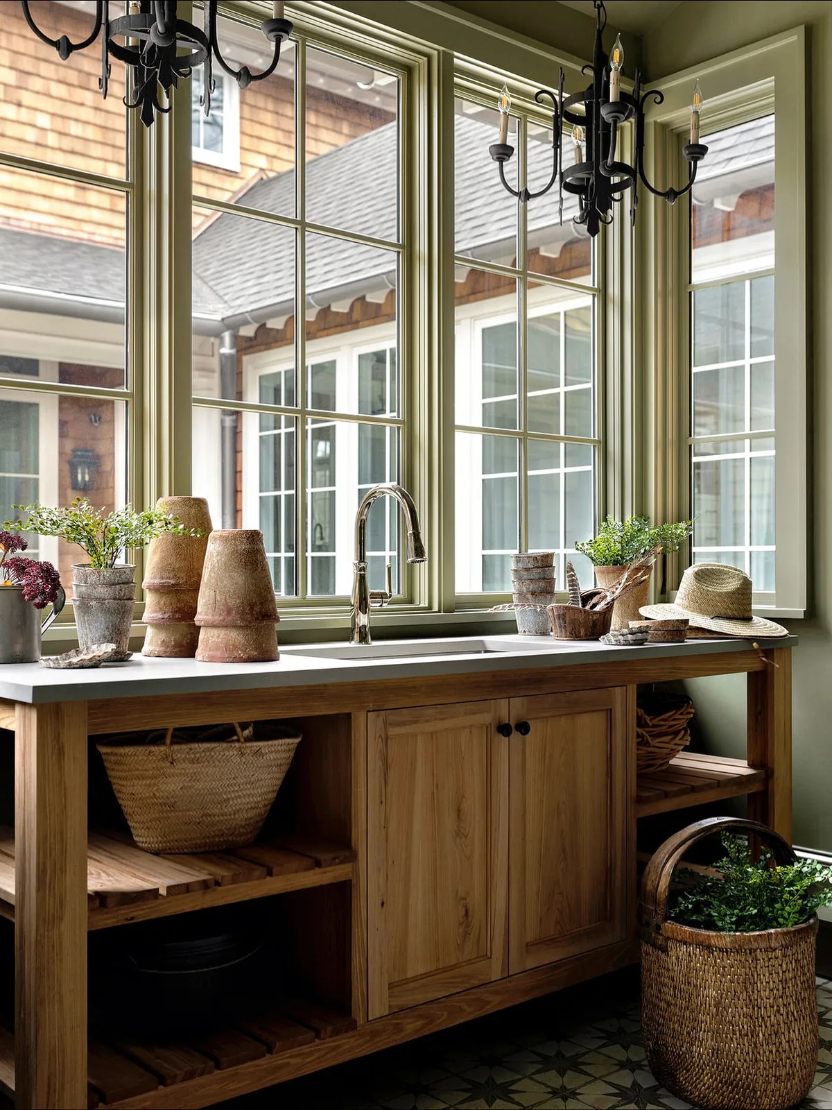 Rustic potting bench with a sink outdoors
