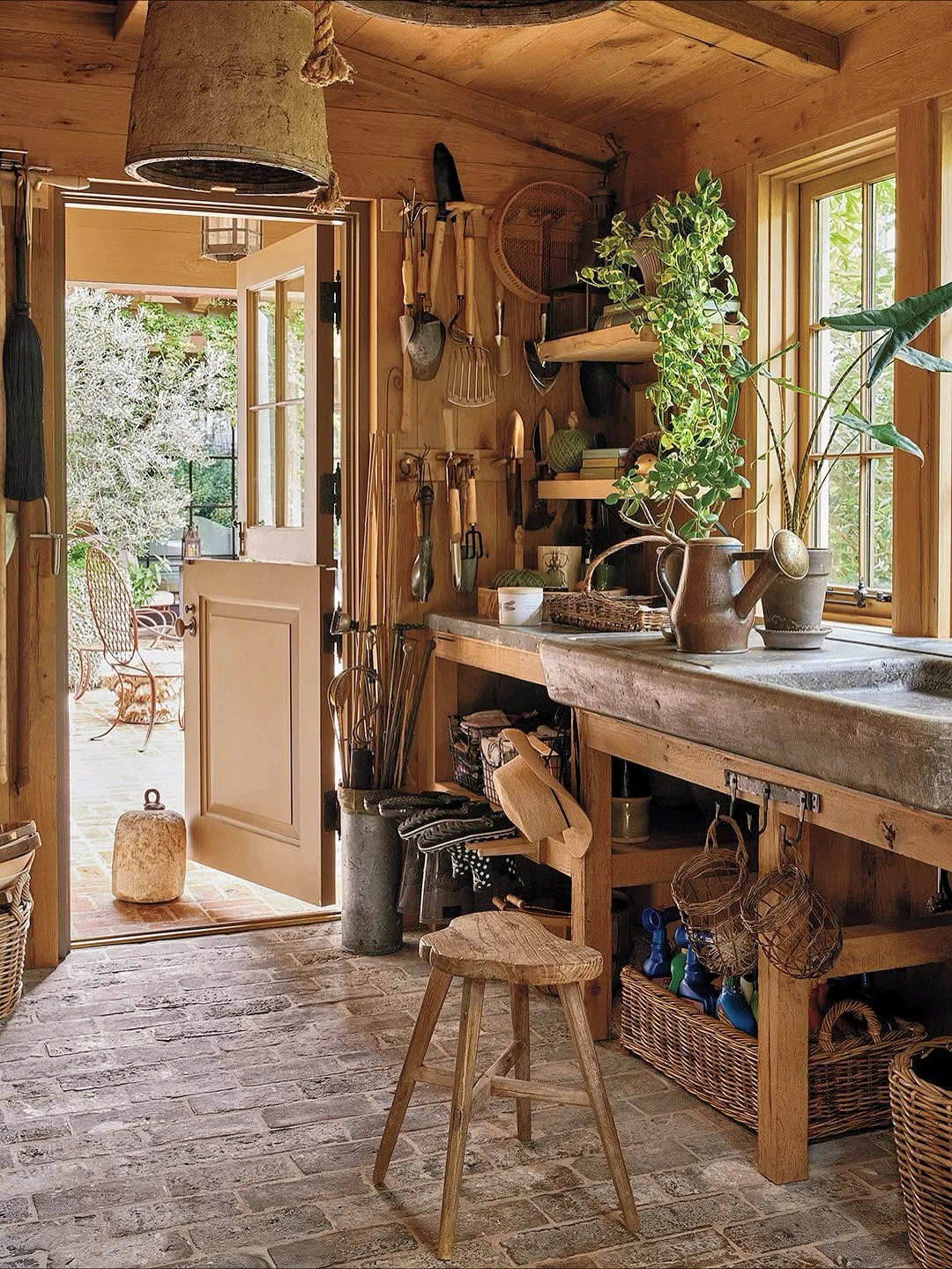 Rustic wood kitchen with a stone floor