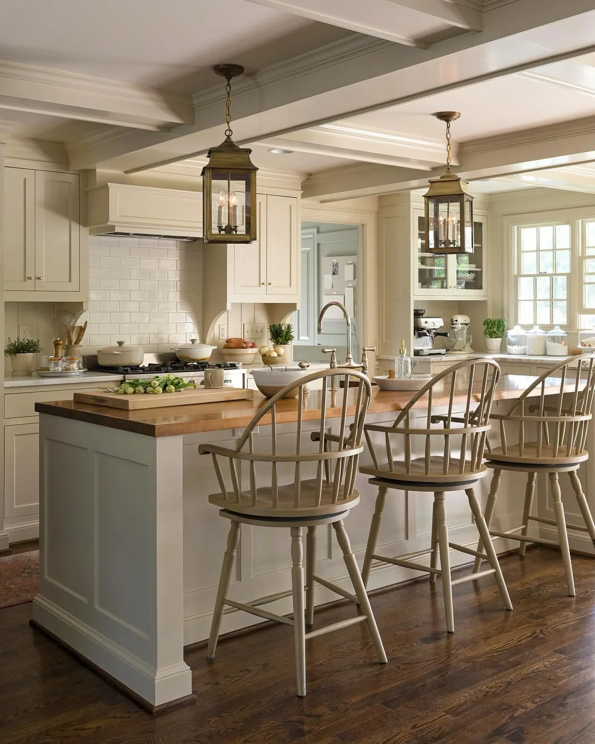 Farmhouse kitchen island with bar stools