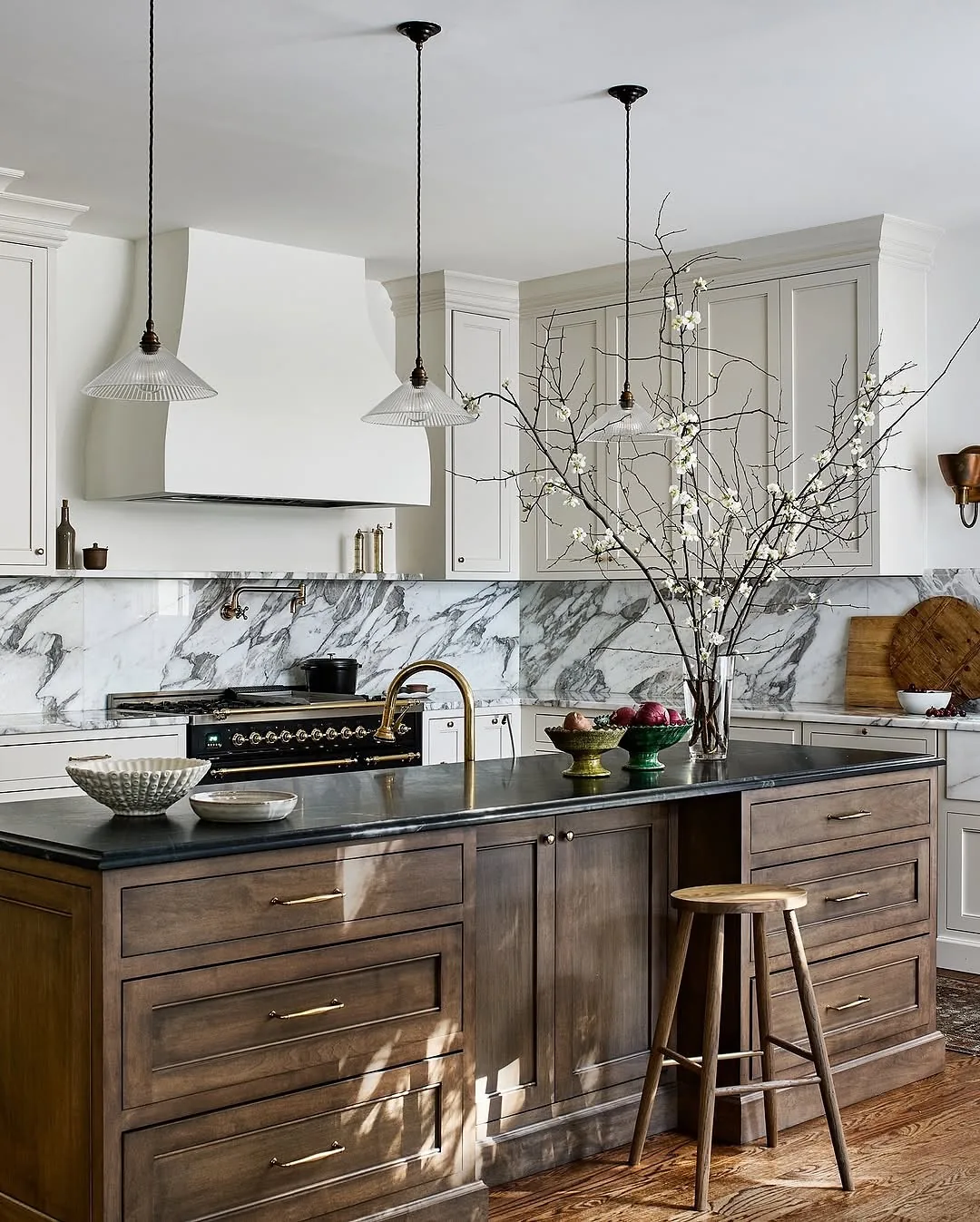 Modern farmhouse kitchen with a marble backsplash