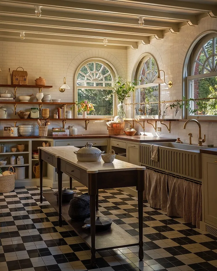 Kitchen with arched windows, checkered floor and open shelves