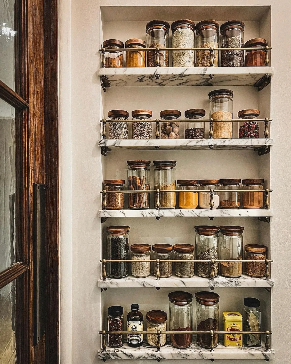 Marble kitchen with spice storage shelves