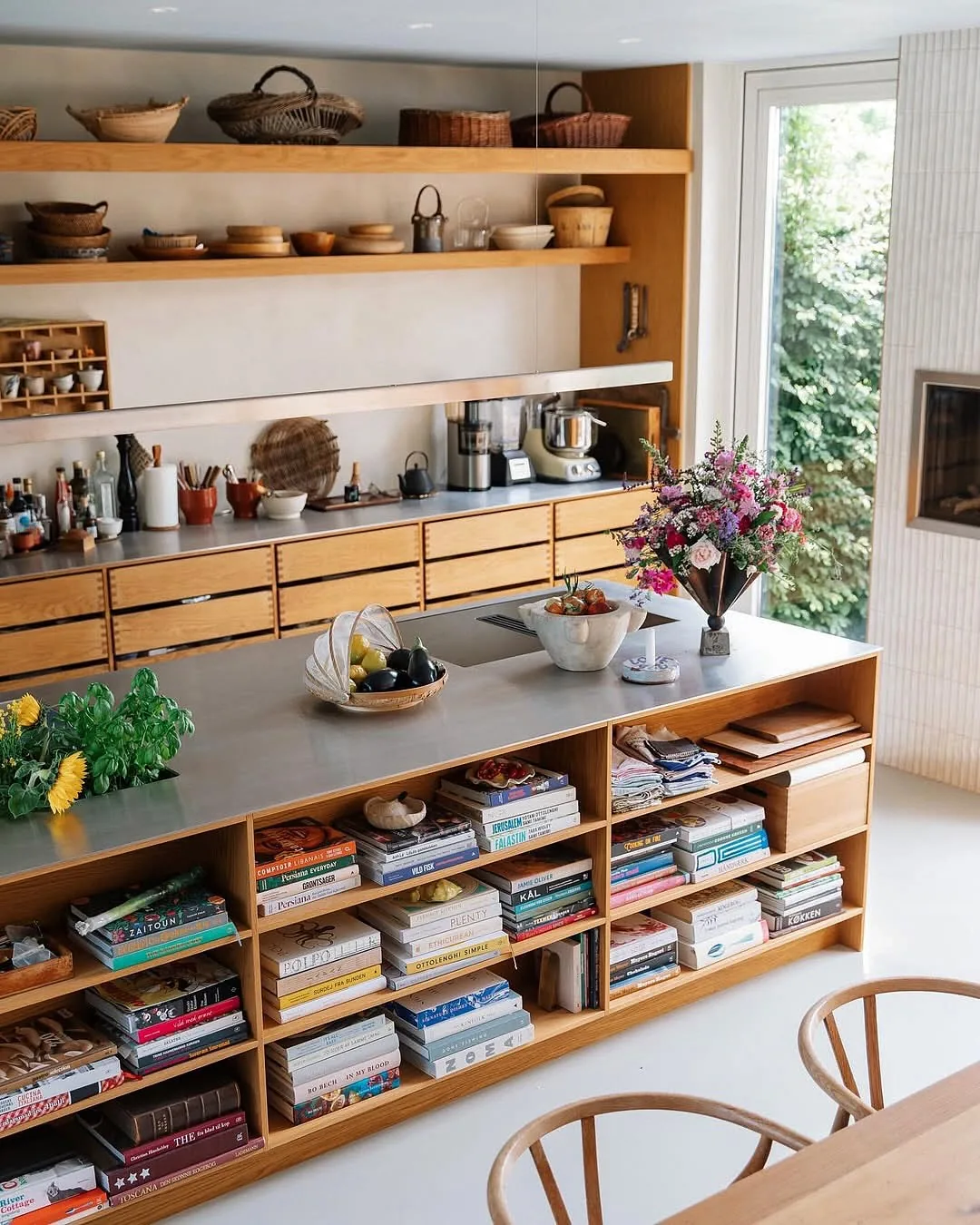 Oak open shelving kitchen with cookbook storage