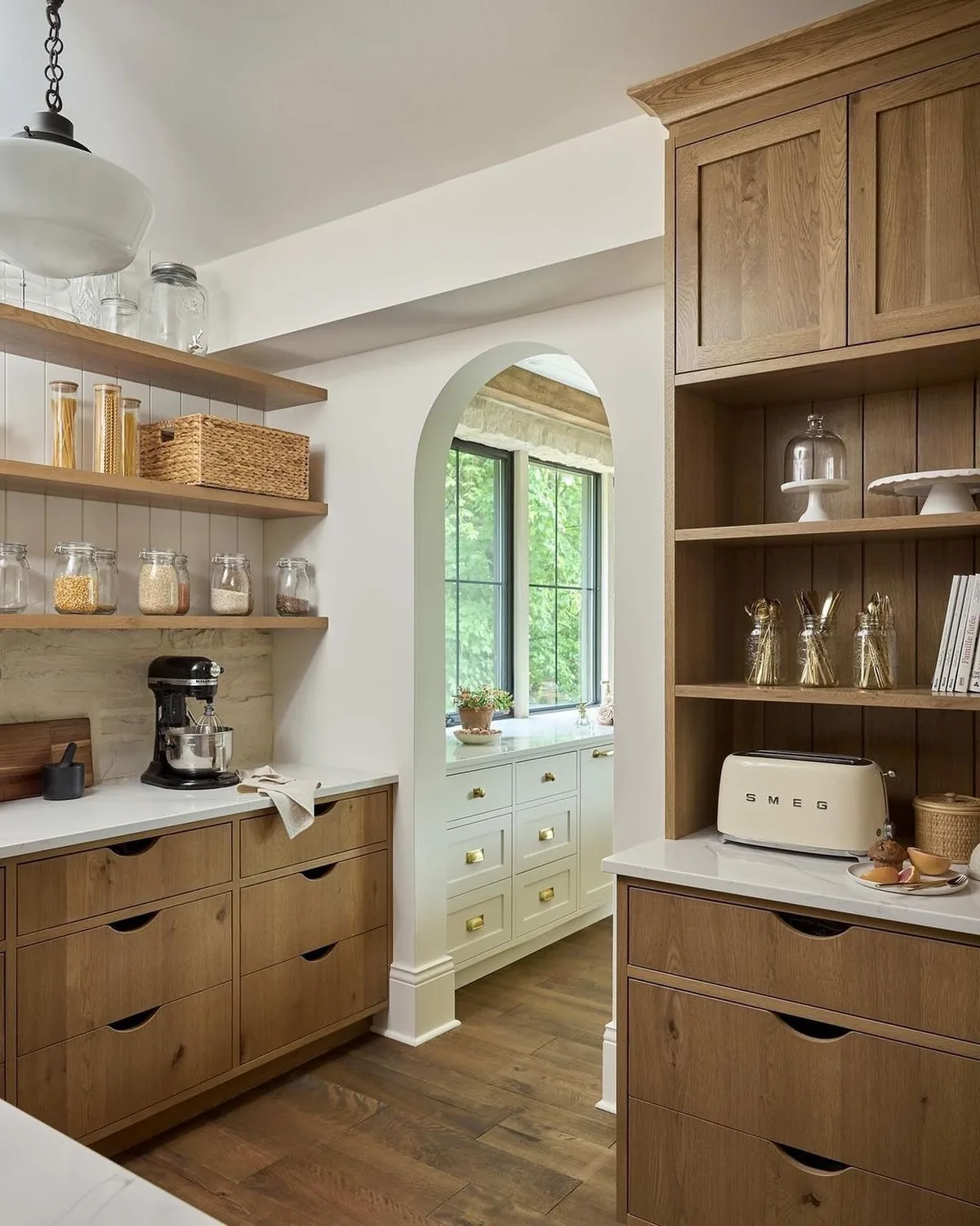 Warm oak kitchen with open shelving