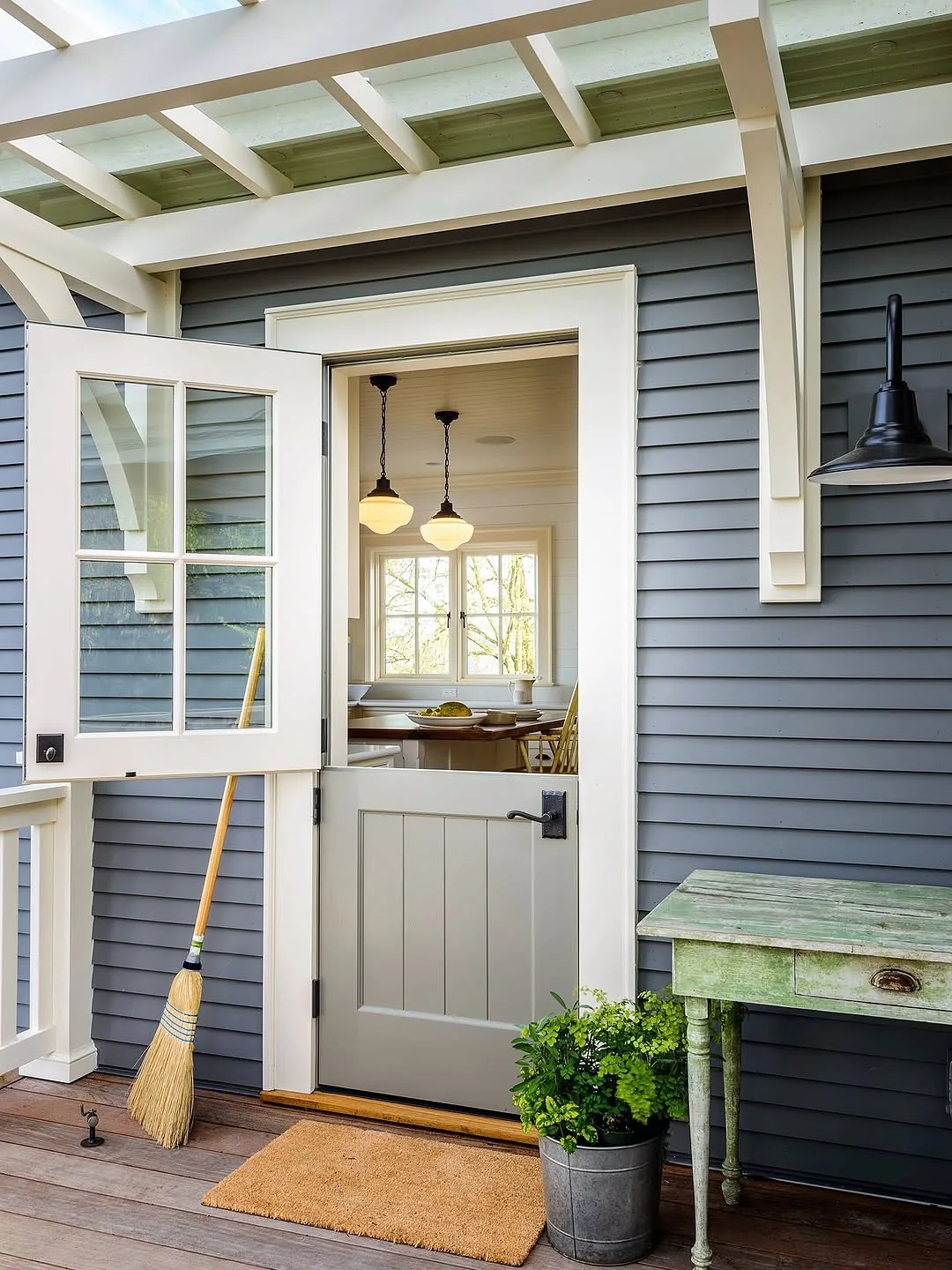Rustic grey Dutch door kitchen entry