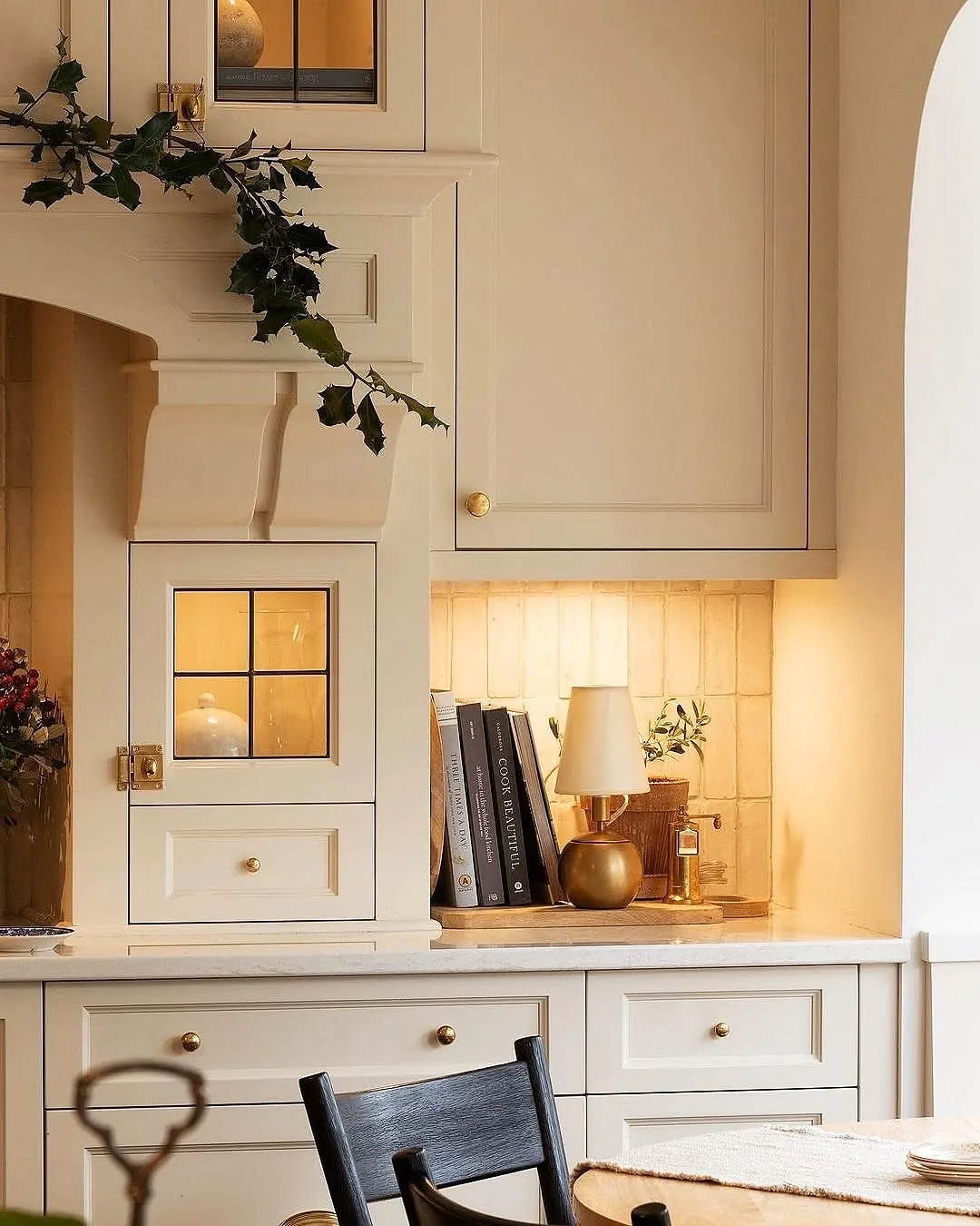 Warm white kitchen cabinet styling