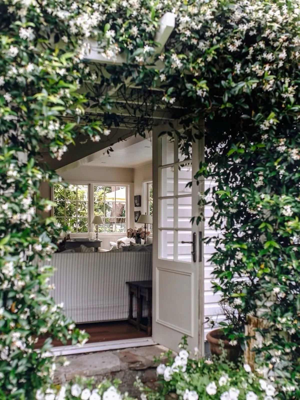 White flower kitchen doorway with arch