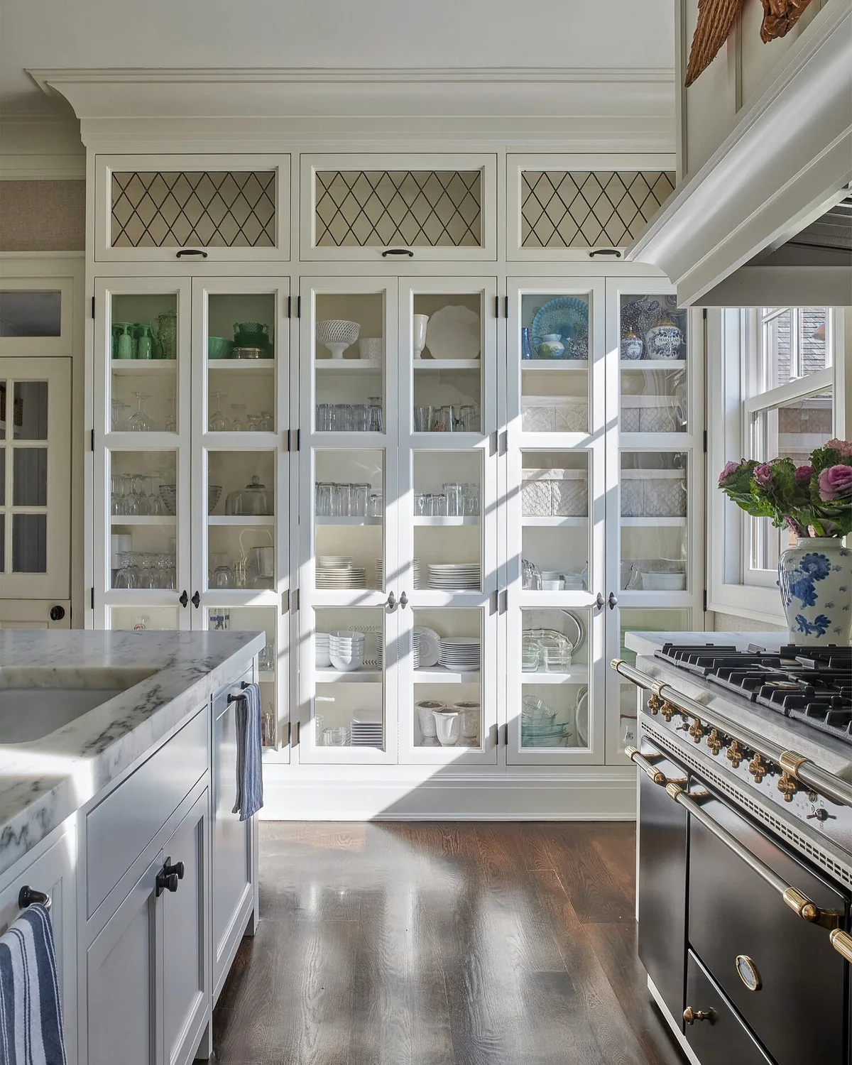 White glass front kitchen cabinets