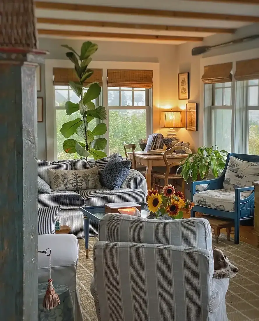 Coastal cottage living room with blue and white decor, natural textures and soft light
