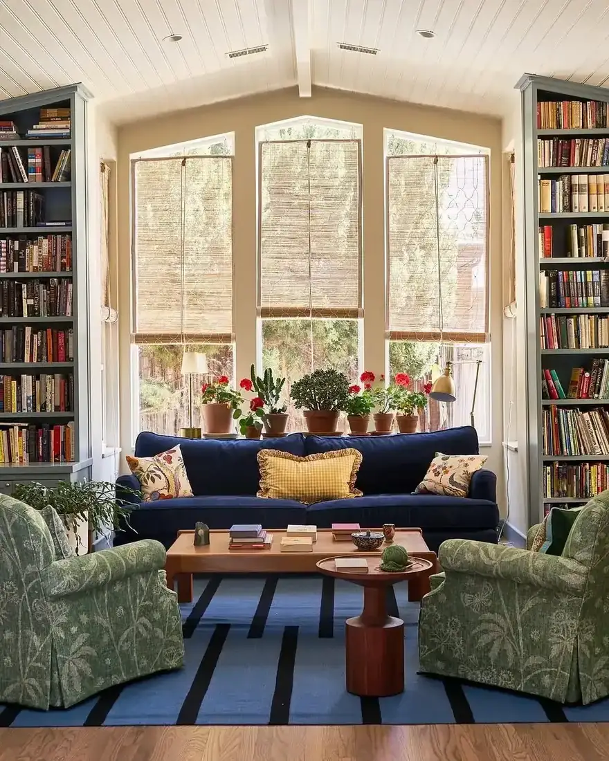 Cozy library living room design with built-in shelves and calm open air