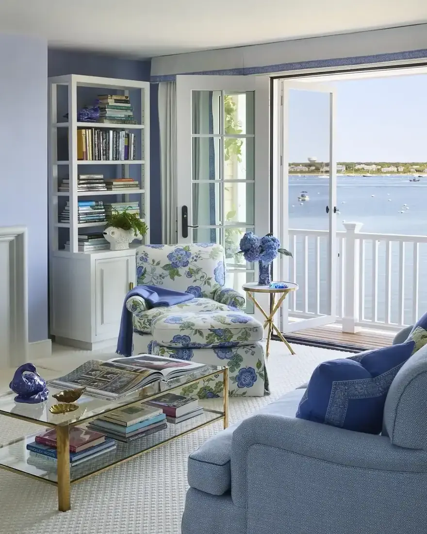 Coastal living room with blue and white palette, harbor view and relaxed seating