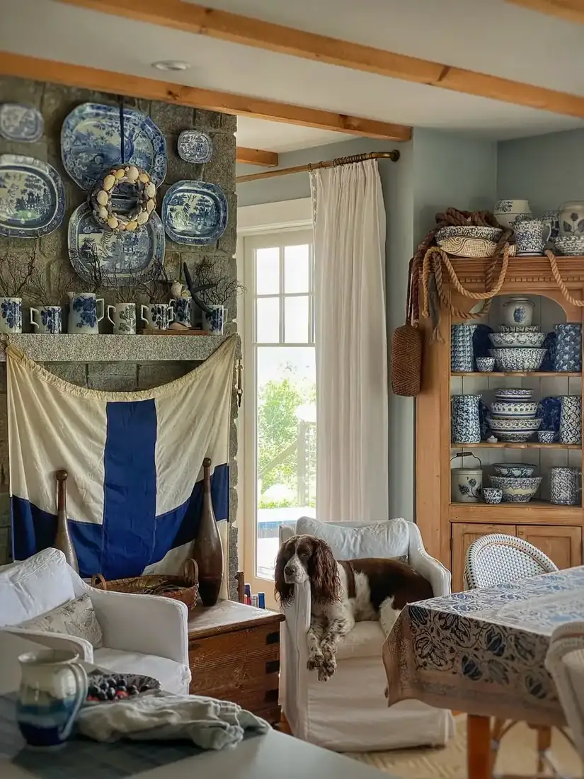 Blue and white coastal living room with whitewashed brick and relaxed seating