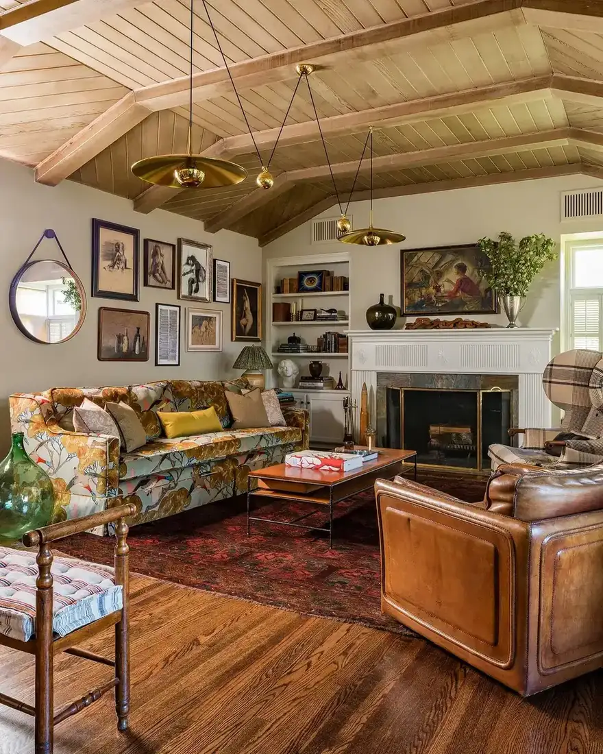 English cottage living room with blue and white textiles and layered patterns