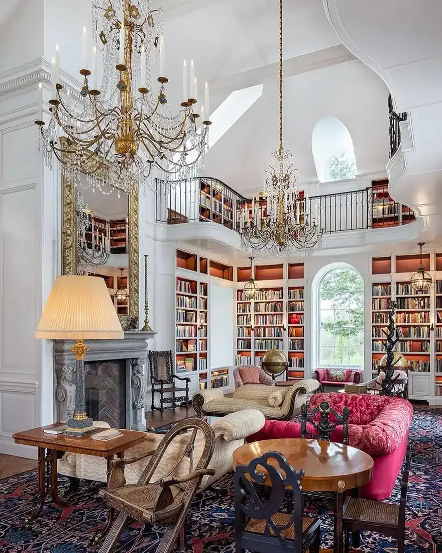 Grand home library reading room with tall windows and symmetrical built-ins