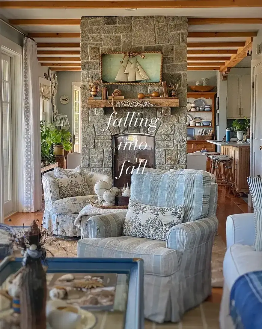 Coastal stone fireplace in bright living room with soft natural texture