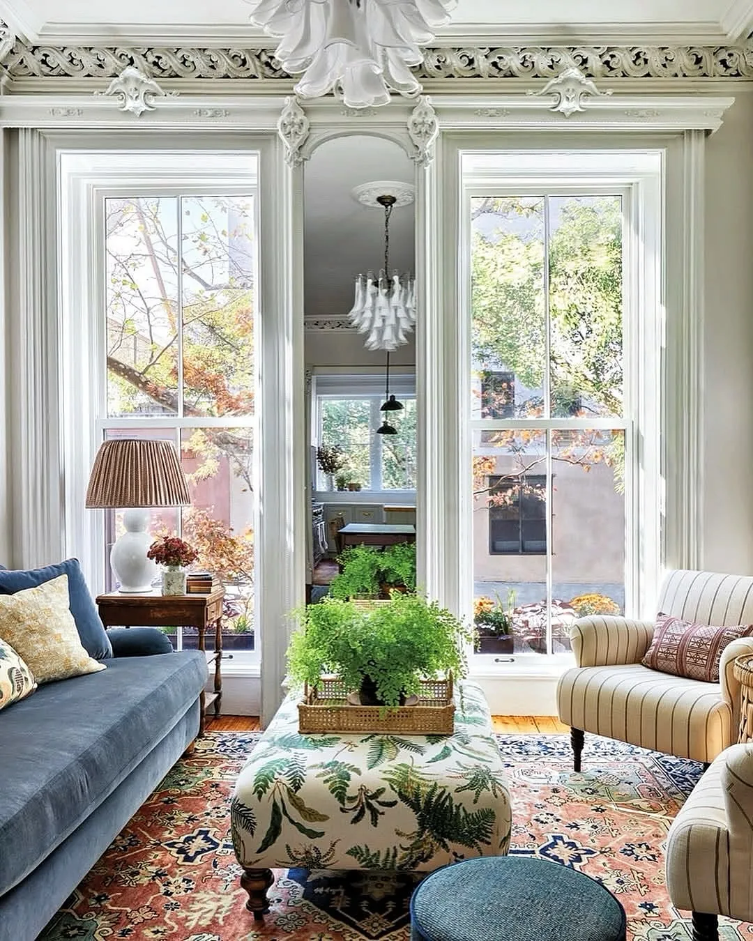 Eclectic traditional living room with collected decor