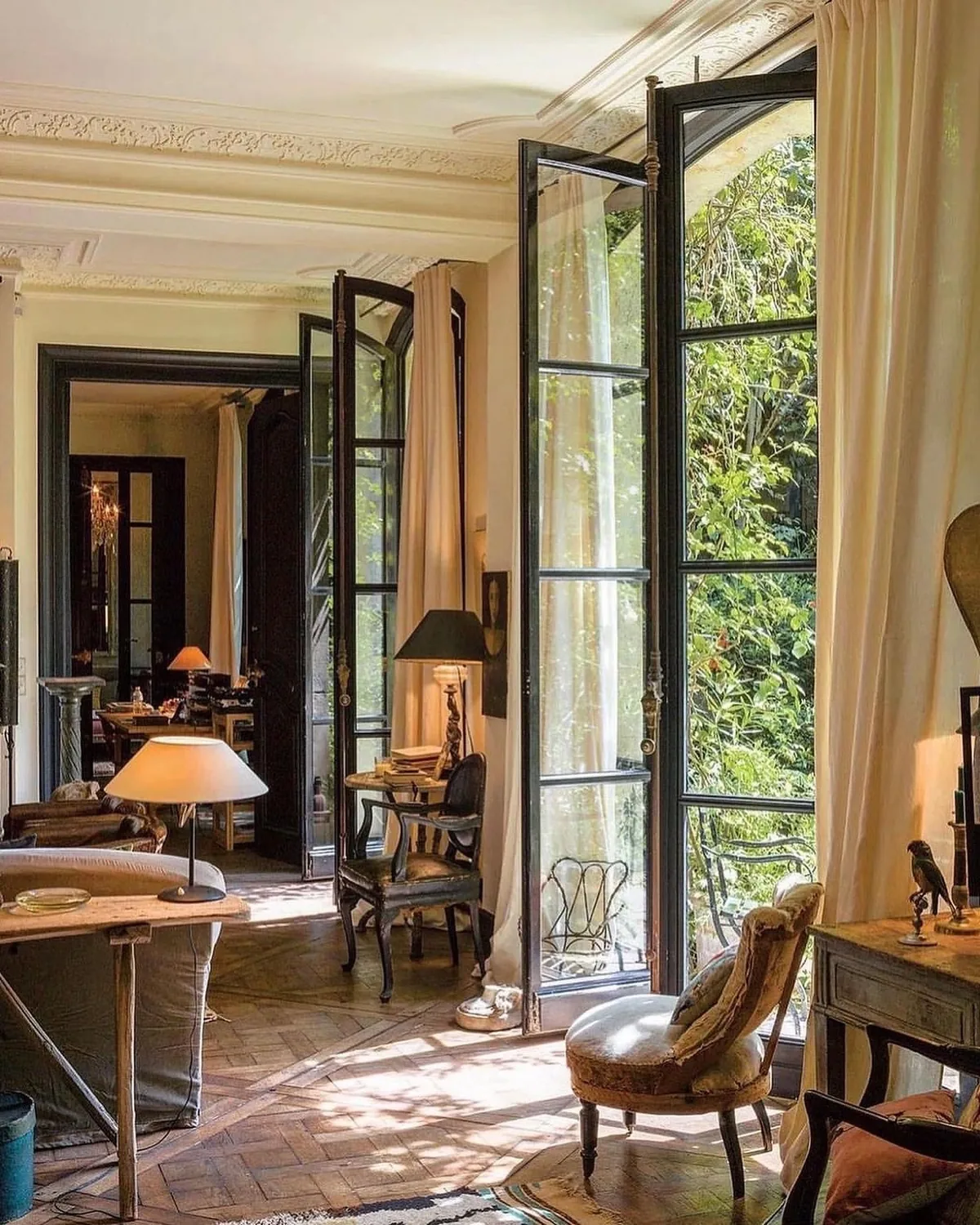 Open French doors with a garden view