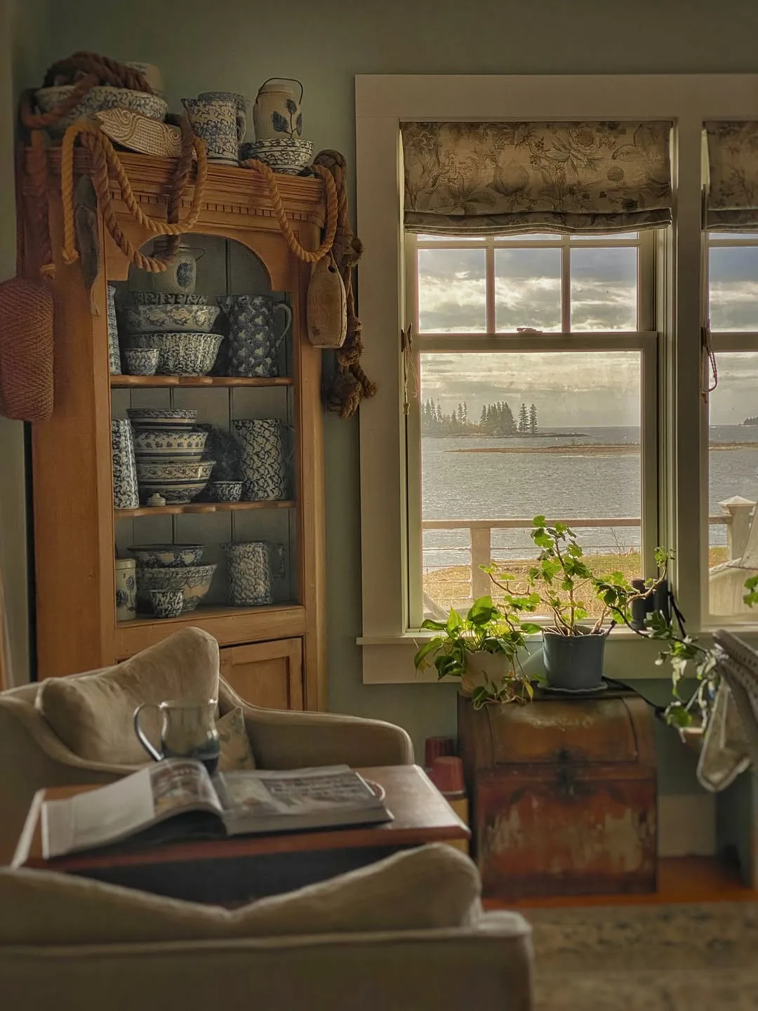 Cozy reading nook with a window view and cushions