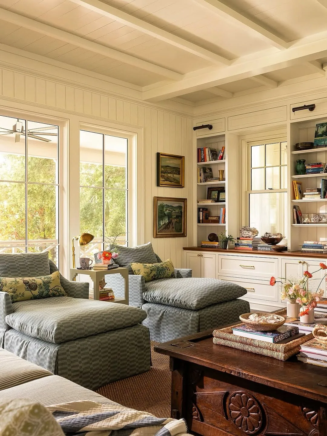 Cozy sunroom reading nook with soft daylight