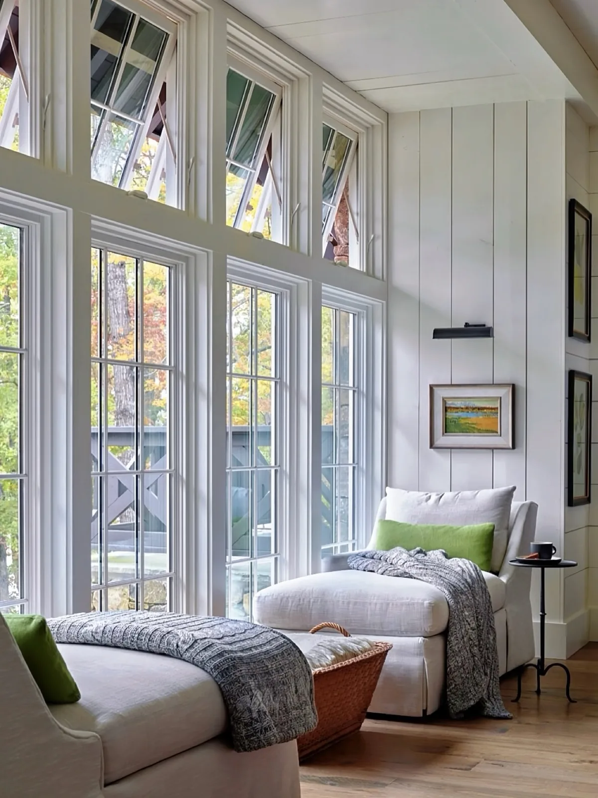 Cozy white sunroom reading nook in soft light
