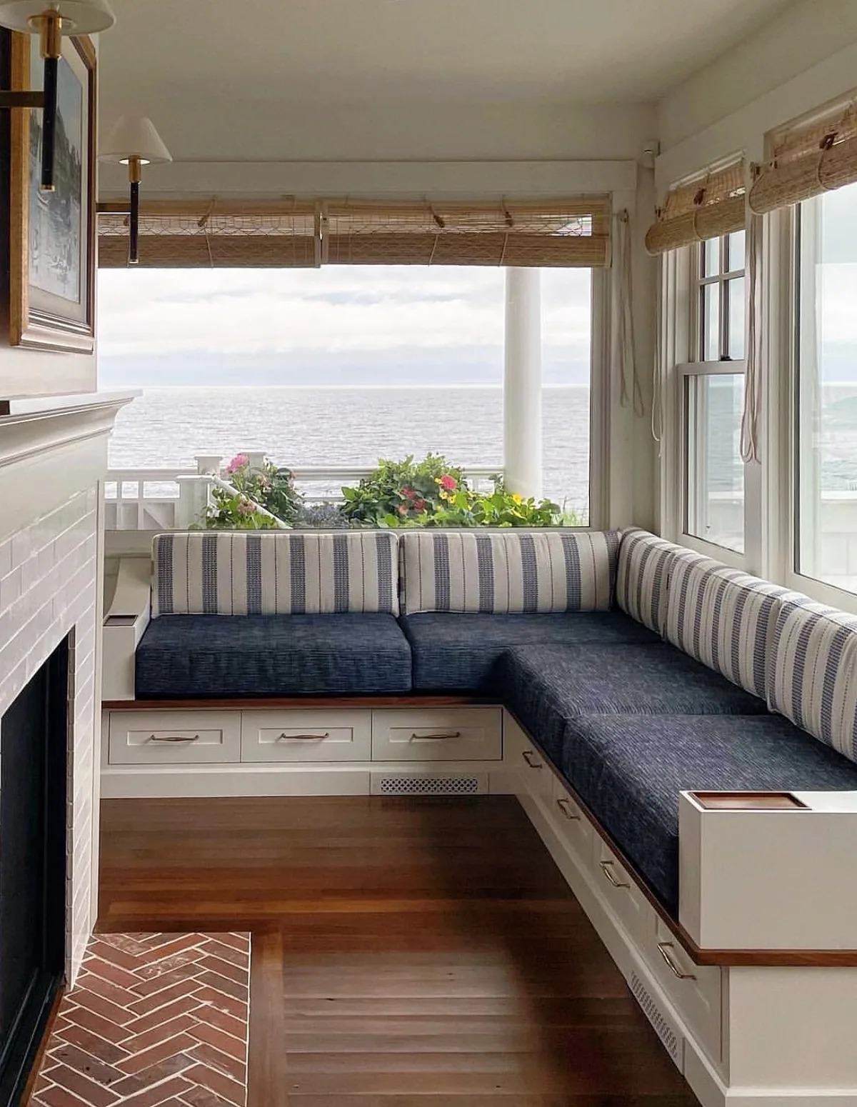 Navy window seat banquette with an ocean view